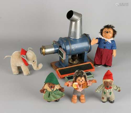 Lot German toys. Circa 1930. Comprising: Four times