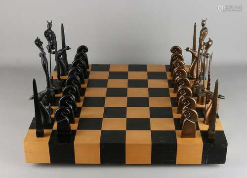 Rare bronze chess with chess pieces. By Paul