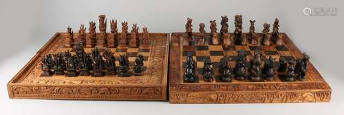 Two large carved chess sets. One time chess Bali. One