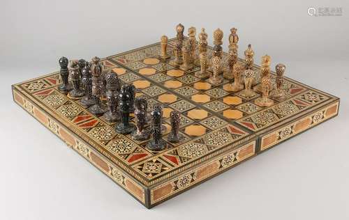 Eastern soapstone chess with intarsia chessboard.