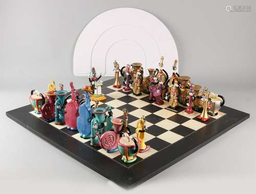 Porcelain chess by Ed Sussman. Glazed. Figurative