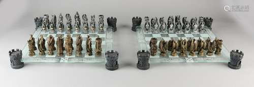 Two chess sets. Drake sets with checkerboard of