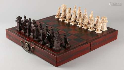 Chinese chess game with pottery figures and chess board