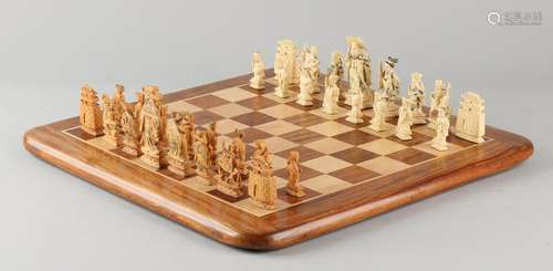 Japanese chess with legs and wooden chess figures.