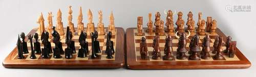 Two carved chess sets. One time set Normans + wooden