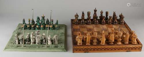 Two chess sets. One time set Mexico, synthetic stone