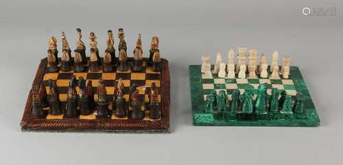 Two chess games. One times malachite, Figures +