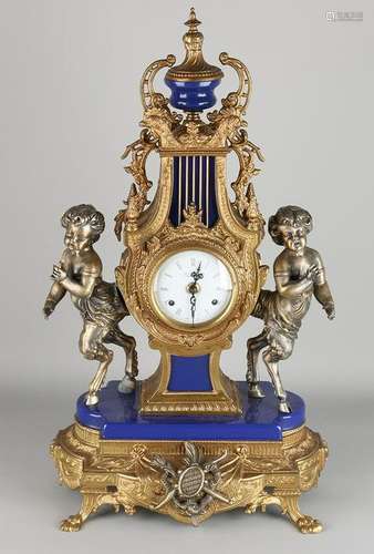 Italian imperial bronze mantel clock with fauns and