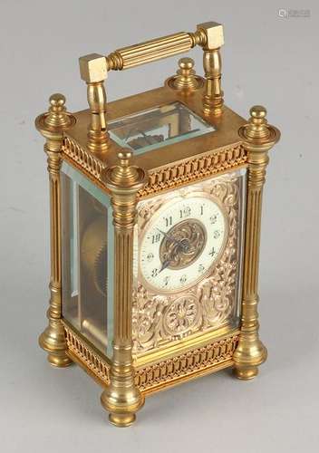 Antique French carved, gilded brass travel clock. Circa