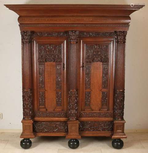 19th century Dutch oak inserted crest cabinet with