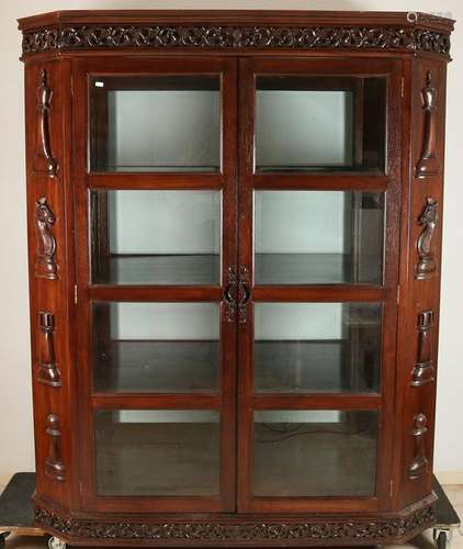 Octagonal teak two-door display cabinet with faceted