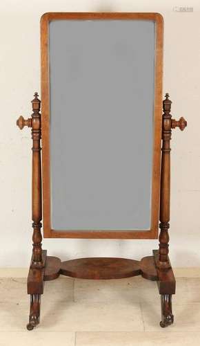 Early 19th century mahogany length mirror on wheels.