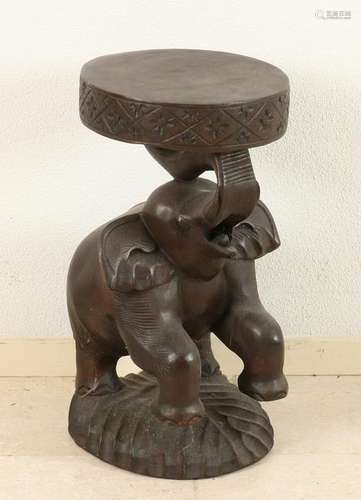 Oriental wood pedestal with elephant stabbed. 20th