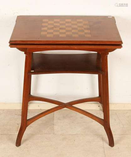 Antique German Jugendstil walnut game table inlaid with