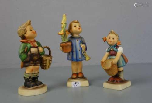 DREI HUMMELFIGUREN / three porcelain figures, 20. Jh., Porzellan, polychrom staffiert.1) 
