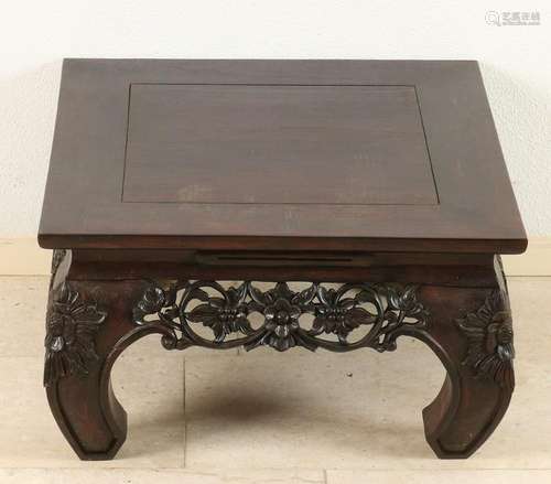 Oriental teak coffee table with floral carvings. Second