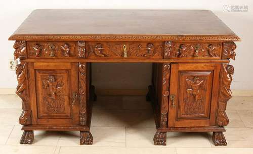 French antique wood stabbed desk with claw feet. Around