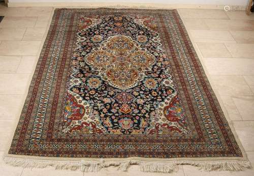 Oriental hand-knotted Kashmir rug with floral decor.