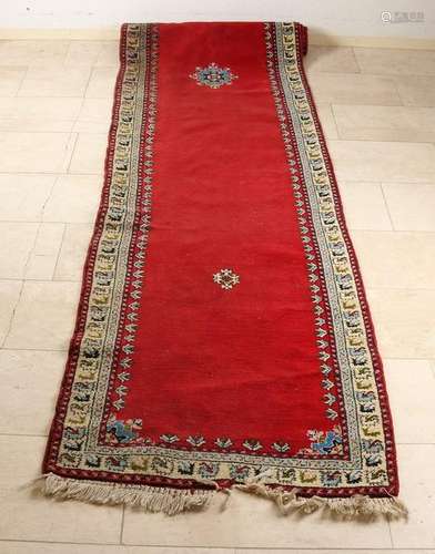 Old hand knotted Persian carpet. Red in color with