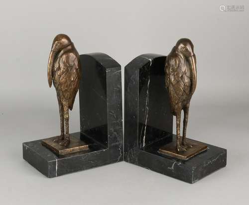 Two bronze marble bookends. 21st century. With marabou