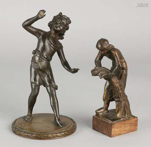 Two old / antique bronze figures. Woman bind to the