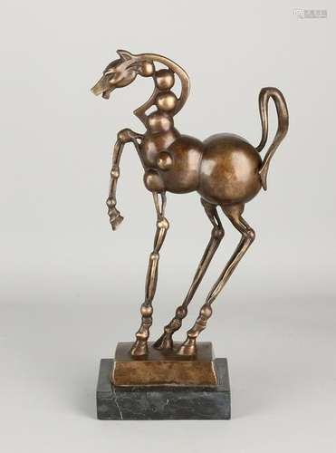 Bronze horse to Salvador Dali, with black marble base.