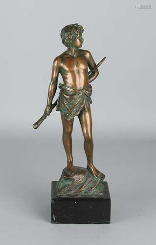 Antique bronze figure. Shepherd boy with stick. Circa