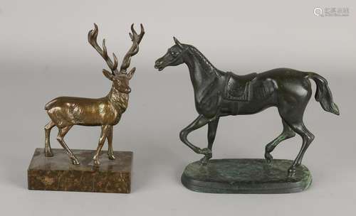 Two antique metal figures. Horse and deer. Composition