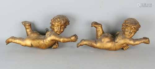 Two 18th - 19th century wooden gilded putti with short