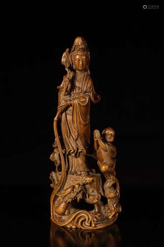 Qing dynasty huangyang wood tongzi guanyin ornament