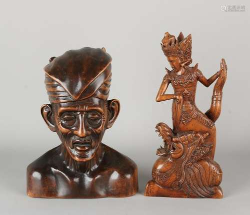 Two old Indonesian timber inserted Figs. 20th century.