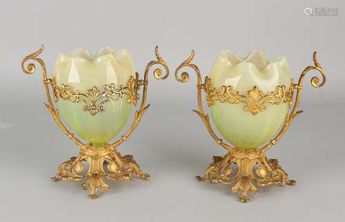 Two glass vases with gilt brass mounts. Mouth-blown.