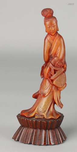 Chinese ancient horn carved geisha with flower basket.