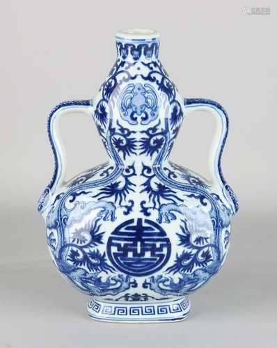 Old blue Chinese porcelain vase with dragons / bat