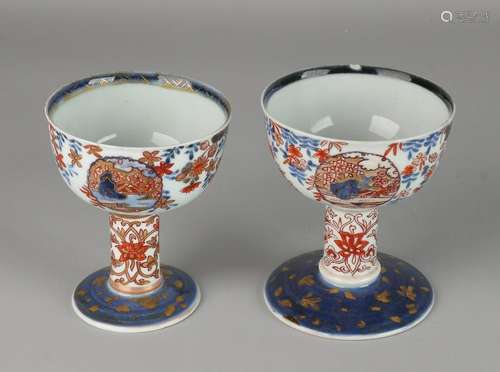 Two antique high Imari (wine) cups on high foot. Floral