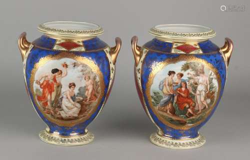 Two Viennese decor porcelain vases with figures and