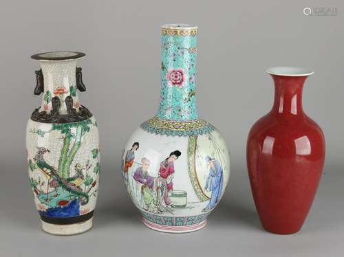 Three old Chinese vases. One meal with red icing and