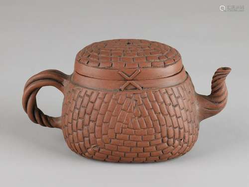 Chinese Yixing teapot with wicker decor. 21st century.