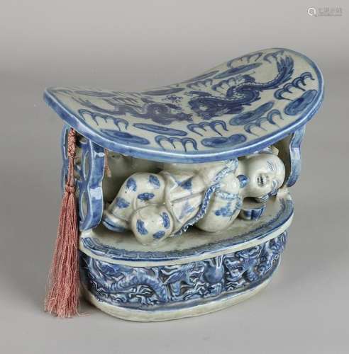 Ancient Chinese porcelain headrest with sleeping