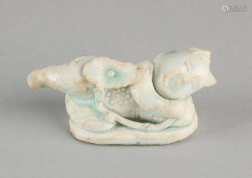 Antique Chinese porcelain FIG. Sleeping child. Chip.