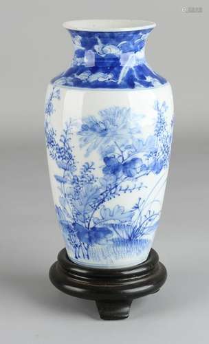 Ancient Chinese porcelain vase with floral decoration.