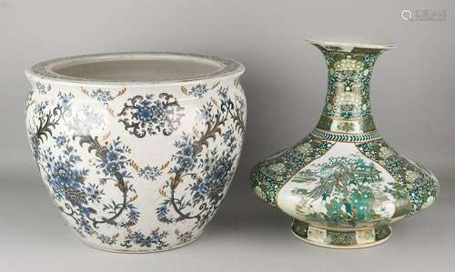 Two Chinese porcelain vases. 20th century. One baluster