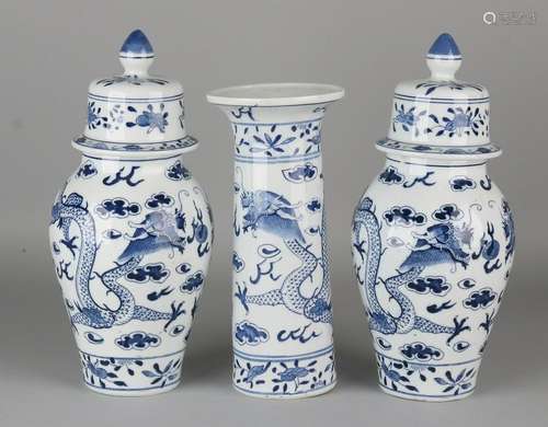 Antique Chinese porcelain garniture with dragons decor.