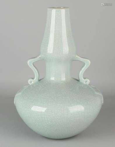 Ancient Chinese porcelain celadon vase. 20th century.