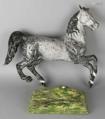 Large porcelain prancing horse painted in Baroque