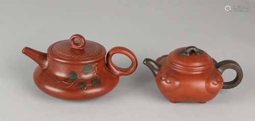 Two ancient Chinese Yixing teapots with bottom mark.