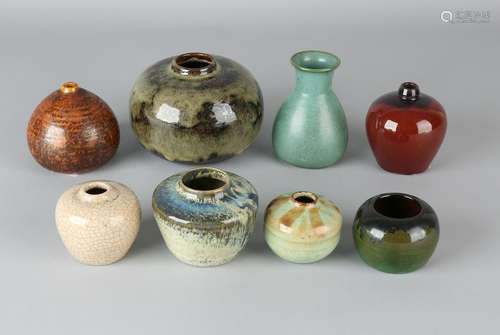 Collection of eight glazed ceramic bolvaasjes. Several