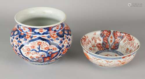 Twice 19th century Imari porcelain with floral decor.