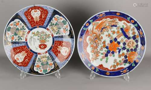 Two large antique Imari porcelain decorative dishes.