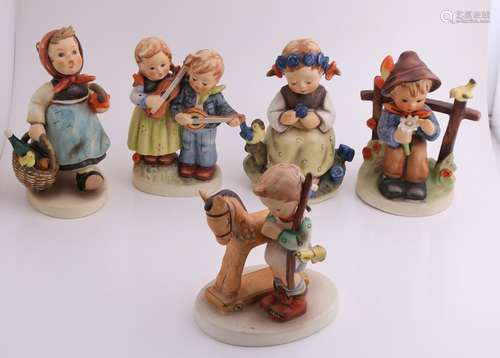 Five various figures of Hummel Goebel. Comprising: Boy